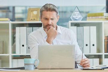 Image showing Businessman, laptop and thinking and confused in office for 404 error, internet glitch or financial report concern. Technology problem, reading website or corporate man research vision on tech