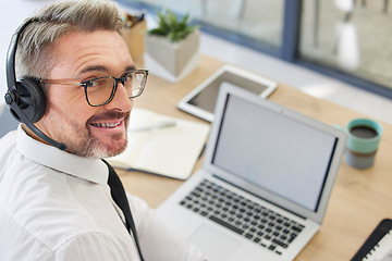 Image showing Mockup laptop, portrait and telemarketing consultant working on sales pitch, call center or customer support. Contact us microphone, telecom communication and man consulting with crm software mock up