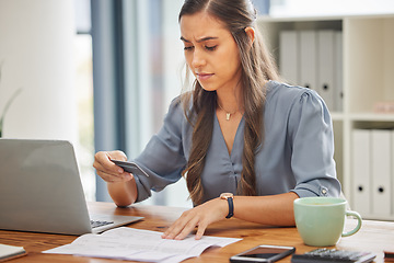 Image showing Credit card, laptop and business woman in office with finance, fintech and banking software for loan application, budget and ecommerce. Accountant, corporate and worker invoice, document and payment