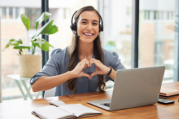 Image showing Woman, call center and laptop with heart gesture for telemarketing, customer service or support at the office. Portrait of happy employee consultant with smile and hands with love symbol by computer