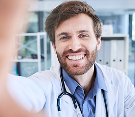 Image showing Healthcare, selfie and doctor with smile in hospital office, happy health care employee or pharmacist. Happiness, medicine and medical worker in clinic taking profile picture for social media website