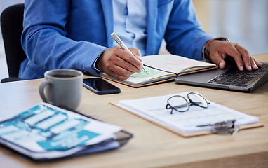 Image showing Business hands, writing and black man with accounting budget, finance and profit in a notebook, laptop and documents at desk. Office worker, accountant and planning strategy for financial investment