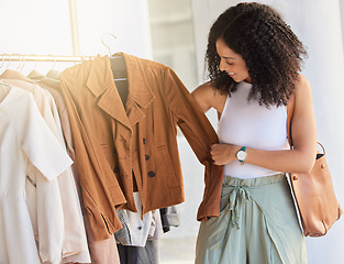 Image showing Retail, fashion and shopping with black woman in store buying for spree, luxury and products sale. Discount, consumer and expensive with girl customer in boutique mall spending for clothes deal