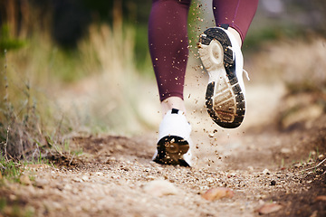 Image showing Foot, dirt and running in nature for fitness, exercise and athletic training for health and wellness. Footwear, trail and cardio jogging in running shoes for sporty, physical and healthy lifestyle