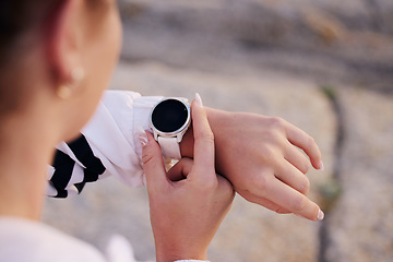 Image showing Smartwatch, fitness and training outdoor, check time and hand after exercise, workout and running in street. Digital technology, marathon and runner hands zoom, heart rate and app for run speed