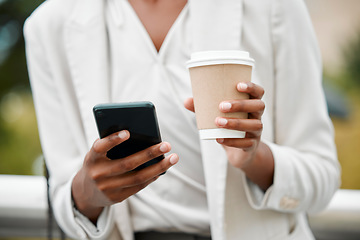 Image showing Business, woman and phone with coffee in the city after a corporate job to browse online with 5g. Social network, social media and businesswoman search the internet on a cellphone on a coffee break