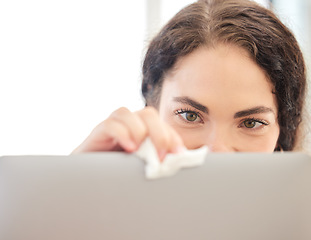 Image showing Woman, cleaning and wipe laptop in home for hygiene, health and wellness. Spring cleaning, housework and female housekeeper sanitizing computer, pc or electronics to remove dust, bacteria or covid 19