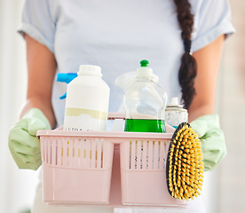 Image showing Cleaning, product and basket with hands of woman for chemicals, housekeeping or disinfection. Hygiene, sanitary and safety with girl cleaner at home in hospitality service for dirt, bacteria and dust