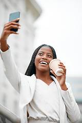 Image showing Corporate woman, phone selfie and coffee in city for morning, work travel or happy employee. Smartphone photography, african businesswoman and smile walking in city street with 5g mobile