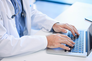 Image showing Doctor, laptop and hand typing email or prescription online for medical treatment in a clinic or hospital. Healthcare, medicine and keyboard with a cardiologist type a research report on the internet