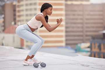 Image showing Black woman, fitness and squat training on rooftop for exercise wellness, body workout and healthy lifestyle motivation outdoor. African woman, muscles and strong legs or core with focus mindset
