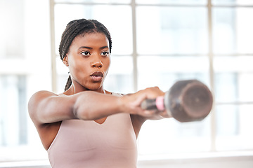 Image showing Fitness, breathing and black woman with kettlebell, body builder and weight training in gym, exercise and focus. Athlete, weightlifting and breath with wellness and strong, muscle and workout studio.