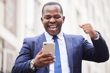 Image showing Success, phone or happy businessman in a city in celebration of good news, job promotion or sales goals. Winner, wow or excited black man celebrates winning a bonus or successful financial investment