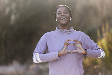 Image showing Black woman portrait, fitness and heart hand sign of a athlete showing love for nature and sports. Happy, excited and laughing sport woman on a run outdoor feeling freedom and gratitude from running