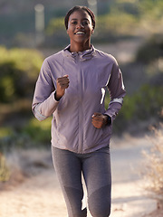 Image showing Fitness, running and black woman on mountain for exercise, marathon training and workout in nature. Sports, wellness and happy female athlete run, jog and exercising for healthy lifestyle in morning