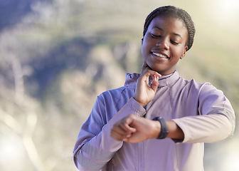 Image showing Heart rate, smartwatch and running with black woman in nature for cardio, progress and goal tracker. Fitness, time and endurance with girl runner checking pulse with watch for marathon training