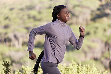 Image showing Fitness, nature and profile of black woman running in countryside, woods or forest for body goals, cardio health or wellness. Exercise, workout and happy African runner training for marathon race