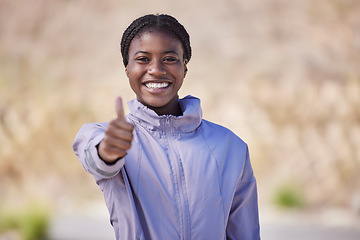 Image showing Portrait, thumbs up and black woman outdoor, training and exercise for fitness, power and wellness. Young female Nigerian, athlete and healthy girl with hand gesture for achievement, goals or workout