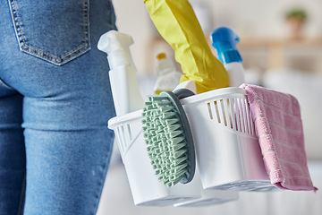 Image showing House, cleaning products and woman hands holding plastic container with cleaner tools. Home, cleaning service and chemical spray bottle of a person ready for spring clean with brush in a basket