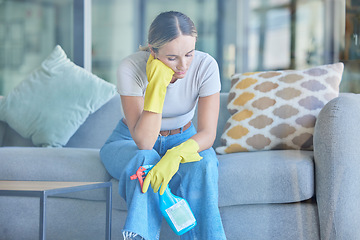 Image showing Tired, thinking and woman cleaning home on break with fatigue, unhappy and frustrated with routine. Spring cleaning, burnout and exhausted girl holding detergent spray thoughtful on lounge sofa.