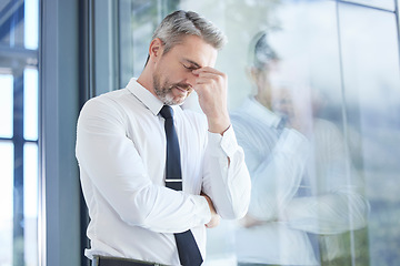 Image showing Window, business man and stress with headache, burnout and overworked in office. Senior male, entrepreneur and ceo frustrated, mental health and leader with depression, pain and tired in workplace.