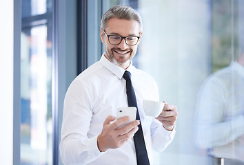 Image showing Phone, coffee and happy businessman in office scrolling on social media, mobile app or the internet. Technology, professional and male manager, leader or boss reading blog on cellphone in workplace.
