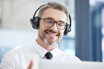 Image showing Call center, customer support and senior man talking to client in telemarketing, friendly service and crm company. Communication, contact us and male consulting agent with headset in customer service