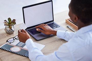 Image showing Credit card, laptop mockup and businessman with fintech, ecommerce or online shopping website for financial wealth, payment and startup loan. Corporate hands, finance black man and banking on screen