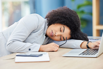 Image showing Black woman, sleeping and office desk while tired, burnout and fatigue while asleep by laptop at corporate company, head on table to relax. Lazy entrepreneur exhausted and sleepy due to work stress