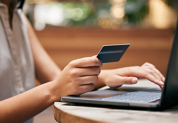 Image showing Credit card, woman hands and laptop at cafe for ecommerce payment, fintech money or online shopping. Closeup customer, coffee shop and computer banking, finance and wealth with internet pc technology