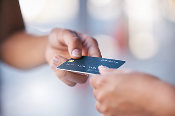 Image showing Hands, credit card and payment with a woman customer and clerk transaction in a mall or store while shopping. Money, finance and retail with a female consumer paying for a purchase on deal or sale