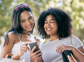 Image showing Phone, shopping and black woman friends outdoor together for a retail sale or deal as a customer. Ecommerce, contact and online shopping with a female and friend using 5g mobile technology to search