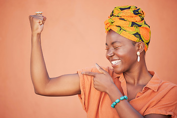 Image showing Power, strong and arm flex with black woman for leadership, gender equality and confident. Muscle, proud and fitness with bicep and fist of girl for success, tough and strength in orange background