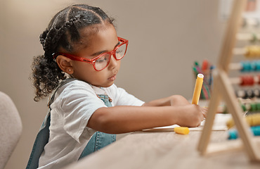 Image showing Home learning, education and girl in kindergarten studying math and knowledge development. House, student and assessment focus and writing of a child working on numbers for a study test at a desk