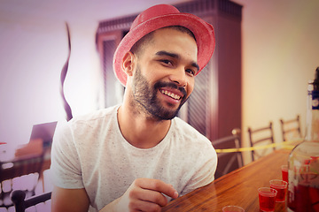 Image showing Man, face and happy at new year, party and celebration with alcohol shots, drink and social with hat, fun and nightlife. Young male, celebrate or happiness while partying, spring break or house party