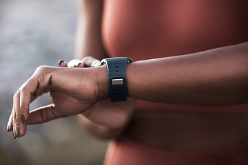 Image showing Hands, fitness and black woman checking time for performance, workout or schedule for exercise. Arm and hand of African American woman monitoring healthy cardio on smart watch for sports training