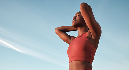 Image showing Freedom, fitness and black woman in nature for running, sports training and relax against a blue sky in South Africa. Wellness, peace and calm African runner with zen from an outdoor cardio workout