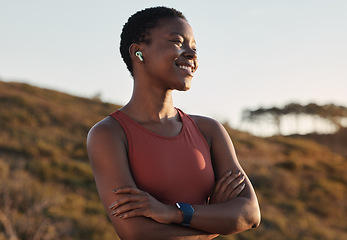 Image showing Black woman runner, smile and music with earphones, nature and hill for fitness, happiness and peace. Outdoor exercise, streaming and smartwatch for girl on training, running or wellness adventure
