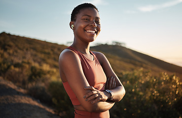 Image showing Black woman runner, happy portrait and music earphones in nature, wellness or happiness on hill. Outdoor exercise, streaming or smartwatch for girl on training, running or wellness adventure in peace