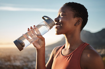 Image showing Water, relax and black woman training in nature, happy hiking and fitness progress in Taiwan. Hydration, thirsty and African runner with a drink after sports exercise, running and morning workout