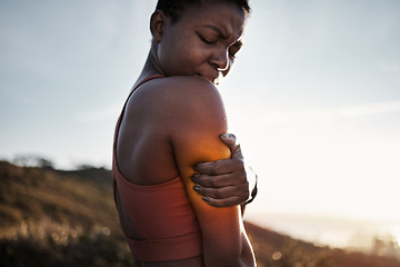 Image showing Black woman, sports fitness and arm pain after exercise accident outdoors. Sunset, health and young female athlete with muscle injury, inflammation or fibromyalgia after intense workout or training