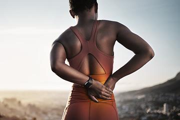 Image showing Back pain, fitness and black woman with spine injury from outdoor sports training. Athlete with backache, joint pain and stress on body muscle from exercise, running and first aid health emergency