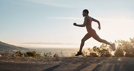 Image showing Black woman, fitness and running on mountain during sunset for workout, training or exercise in the nature outdoors. African American woman runner in sport exercising for healthy cardio on mockup