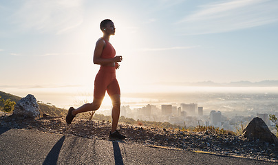 Image showing Black woman, runner and fitness with music on mountain for sports wellness, podcast and cardio training outdoor. African woman, running and exercise workout or streaming radio for freedom in nature