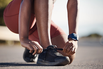 Image showing Lace shoes, sports woman and street workout for cardio training, running and outdoor. Marathon runner, athlete and girl tie sneakers to start exercise, fitness and performance for healthy lifestyle