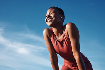 Image showing Fitness, black woman and smile in relax for running, exercise or workout in the nature outdoors. Happy African American female runner smiling on a break from run, exercising and breathing fresh air