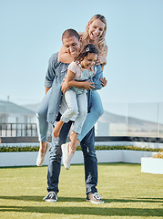 Image showing Family, happy and playful together outdoor for love, support and quality time in nature park on summer vacation. Father, mother and child happiness, piggyback bonding and sunshine on travel holiday