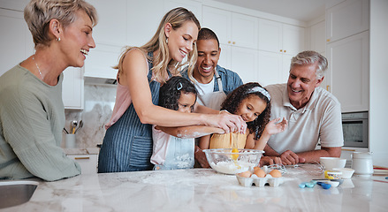 Image showing Happy family, children or bonding in fun baking in house or home kitchen and interracial father, mother or senior grandparents. Smile, happy or cooking kids with women, eggs or retirement elderly men