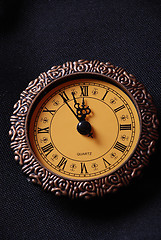 Image showing old clock showing time about twelve