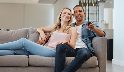 Image showing Mature couple, living room and watching tv, news and movie, cable show or media broadcast on sofa for easy lifestyle. Happy people television subscription, home streaming and change tv show on remote